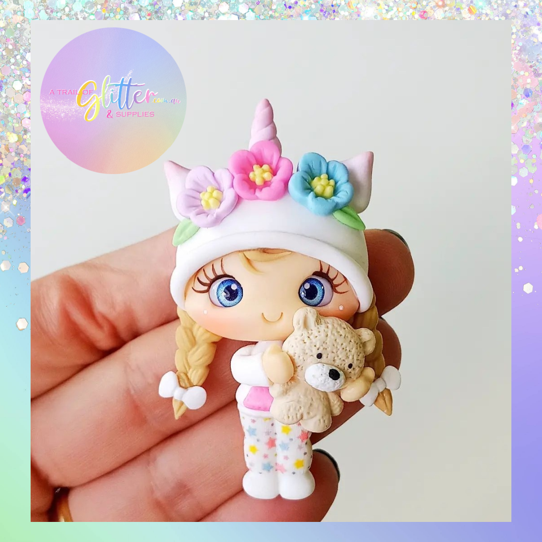 A girl and her teddy